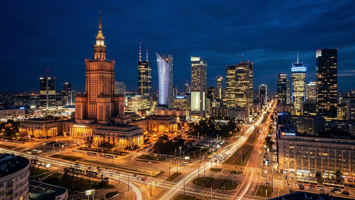 A Warsaw skyline at dusk — emblematic of Poland's maturing digital economy